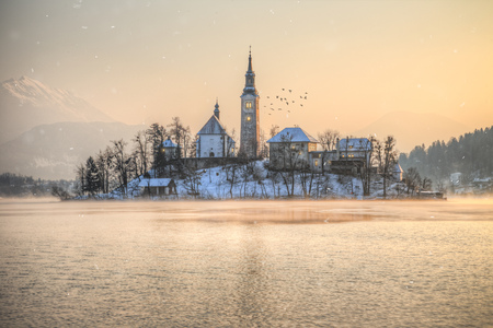 Amazing sunset at the lake Bled in winter, Slovenia, Europe.の写真素材