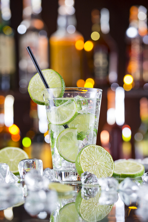 fresh mojito drink on bar desk.の写真素材