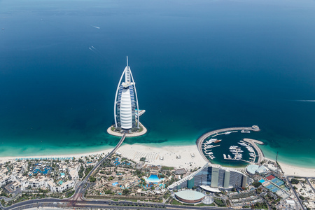 DUBAI, UAE - MAY 28: Burj Al Arab hotel on May 28, 2018 in Dubai, UAE. Burj Al Arab is a luxury unofficial 7star hotel built on an artificial island in front of Jumeirah beach. View from hydroplane.のeditorial素材