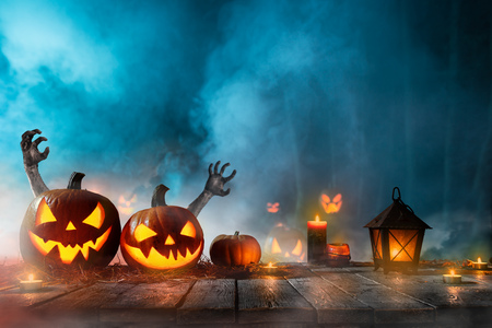 Halloween pumpkins on old wooden planks.の写真素材