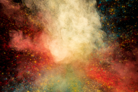 Colored powder explosion on black background. Freeze motion.の写真素材