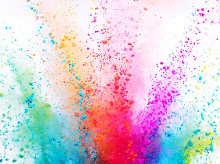 Colored powder explosion on whiteの写真素材