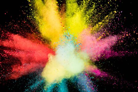 Colored powder explosion on black background.