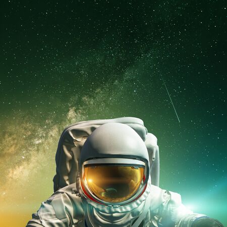 Astronaut at spacewalk. Concept of conquering the universe by the human race.