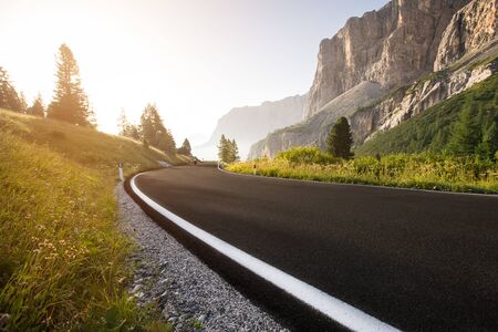 Asphalt road in Dolomites in a summer day.の写真素材