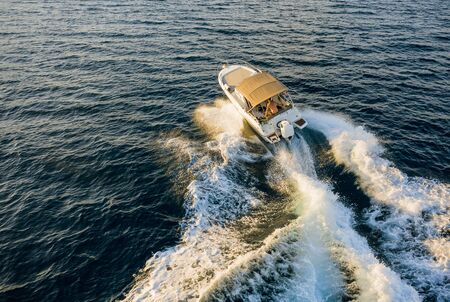 Speed boat in mediterranean sea, aerial view