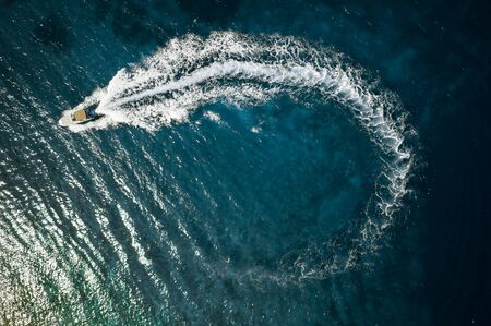 Speed boat in mediterranean sea, aerial view