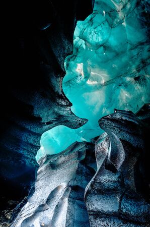 Blue crystal ice cave, underground beneath the glacier in Icelandの写真素材