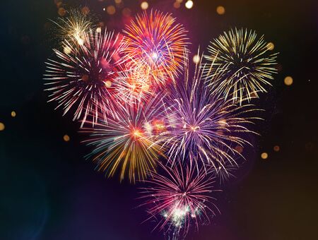 Colorful firework with bokeh background. New Year celebration.の写真素材