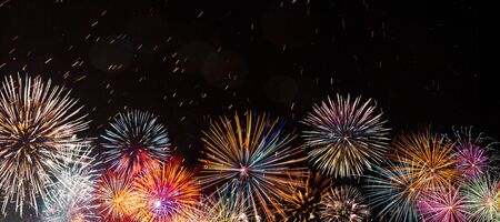 Colorful firework with bokeh background. New Year celebration.