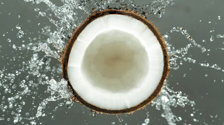 Freeze Motion of Water Splashing on Coconutの写真素材