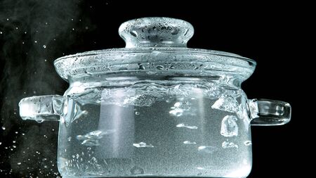 White Steam Ascends from Glass Potの写真素材