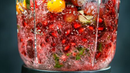 Fresh smoothie blended in blender, back view
