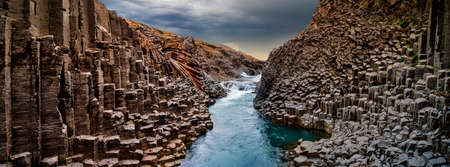 Breathtaking view of Studlagil basalt canyon, Iceland.