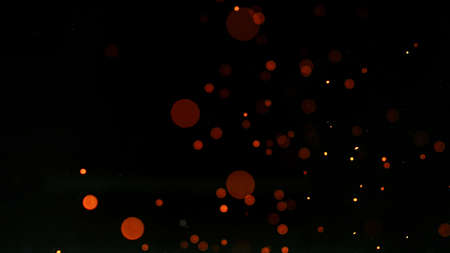 Flying sparks isolated on black background