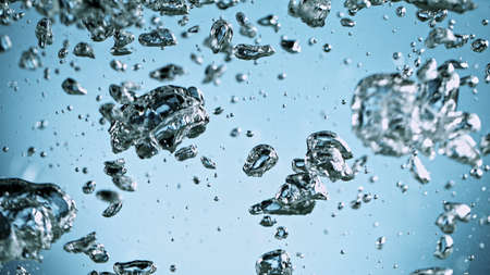 Air bubbles in water against blue background