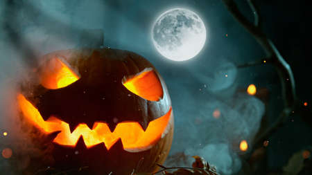 Halloween Pumpkin On Wooden Plank With Candlesの写真素材