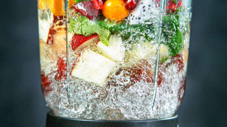 Fresh smoothie blended in blender, back view