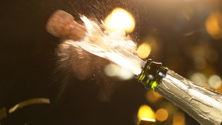 Champagne explosion with flying cork closure.の写真素材