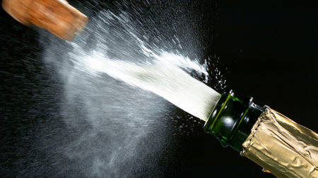 Champagne explosion with flying cork closure.の写真素材