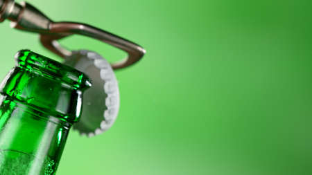 Freeze motion of opening beer bottle.の写真素材
