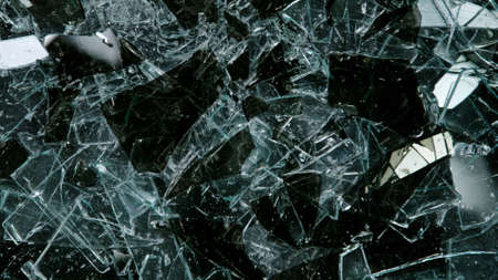 Break glass isolated on black background.