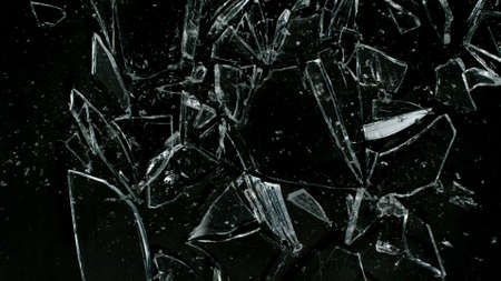 Break glass isolated on black background.