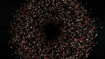 Freeze Motion Shot of Rotating Peppers Balls.の写真素材