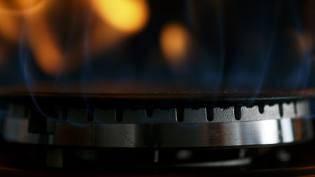 Gas is switching on, apearing blue flame.