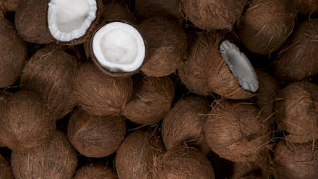 Cracked coconuts falling, freeze motion