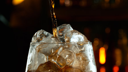 Freeze motion of pouring cola, macro shotの写真素材