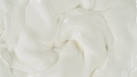 Freeze motion of whirling milk cream, close-upの写真素材