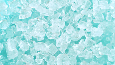 Super slow motion of rotating ice cubes, top view shotの写真素材