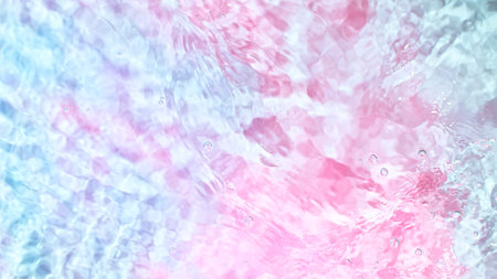 Freeze motion of splashing water surface on light neon backgroundの写真素材