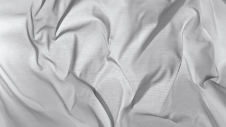 Pastel color transparent silk fabric flowing by wind, close-upの写真素材