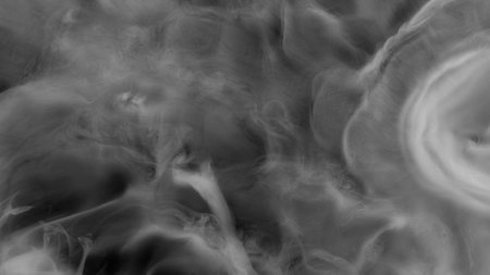 Abstract Atmospheric White Smoke Texture Background on Blackの写真素材