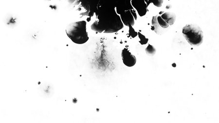Macro Shot of Black Ink Drops Isolated on White Backgroundの写真素材