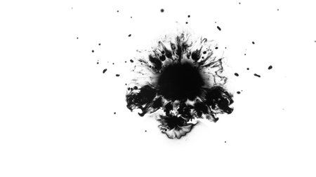 Macro Shot of Black Ink Drops Isolated on White Backgroundの写真素材
