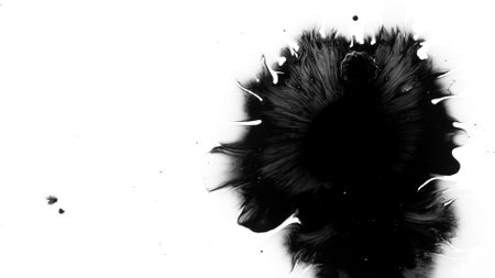Macro Shot of Black Ink Drops Isolated on White Backgroundの写真素材