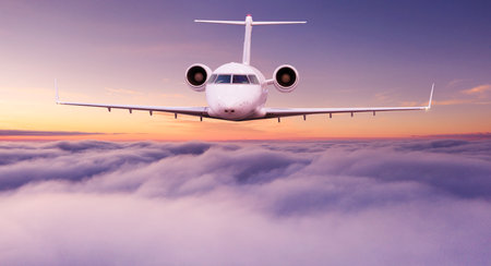 Passengers commercial airplane flying above clouds in sunset light. Concept of fast travel, holidays...