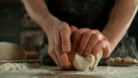 Freeze Motion of Chef Making Yeast Dough . Closeup of Bread or Pizza Dough Preparation