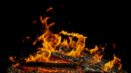 Freeze motion of campfire flames isolated on black background