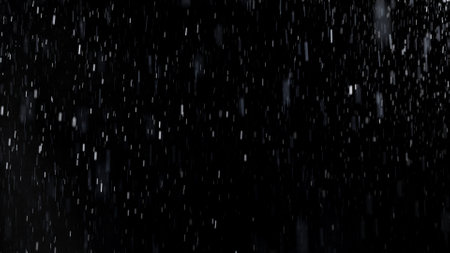 Freeze Motion of Rain - Falling Water Drops Isolated on Black Backgroundの写真素材