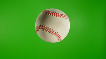 Detail Shot of a White Baseball Ball on Green Screen Backgroundの写真素材