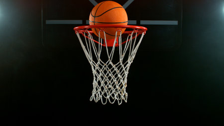 Freeze motion of basketball ball hitting the basketの写真素材