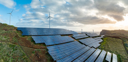 Solar energy panels photovoltaic cell and wind power plants on the seashore landscape for production...