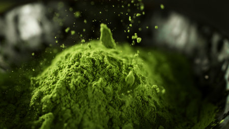 Freeze Motion Detail Shot of Sprinkling Matcha Powderの写真素材