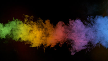 colorful rainbow holi paint color smoke isolated on black backgroundの写真素材