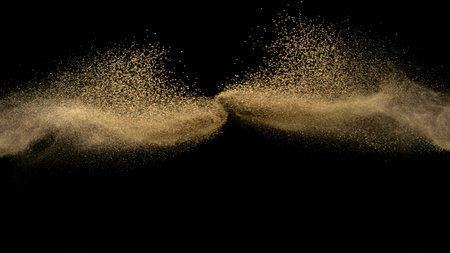 Freeze Motion Shot of Flying Soil , Isolated on Black Backgroundの写真素材
