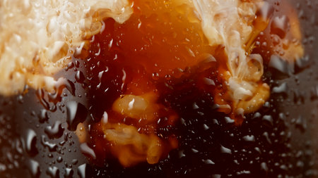 Macro Shot of Pouring Milk into Ice Coffee, Close-upの写真素材